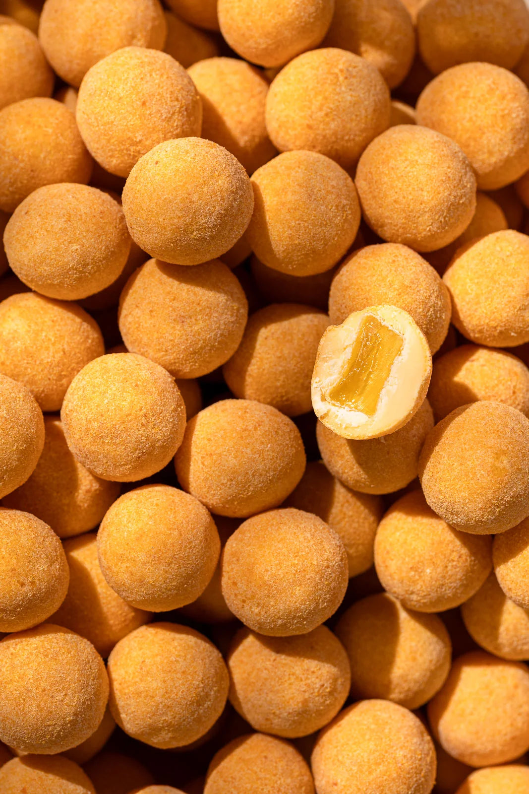 Mango Passion - Chocolate coated winegum